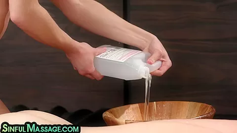 Oiled masseuse pleasing blindfolded guy with her oiled ass