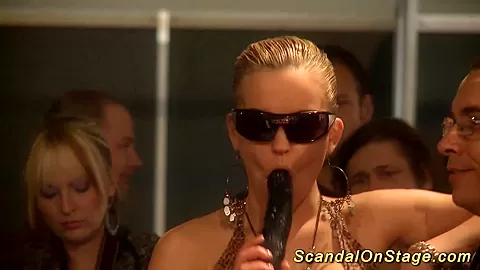 busty babe fisting on public stage
