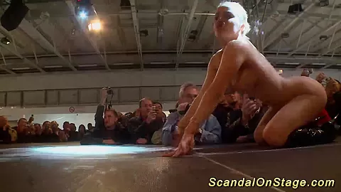 busty babe fisting on public stage
