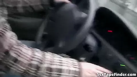 Public slut sucks cock in the car while stopped