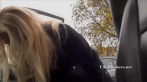Amateur blonde Jakki flashes in her car and shows off shaved pussy and sexy lingerie to fans outdoors