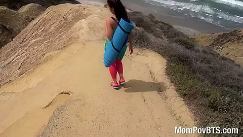 Fitness pro does nude yoga on beach