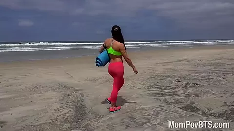 Fitness pro does nude yoga on beach