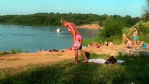 Jennifer in outdoor sex video with a couple fucking on a beach