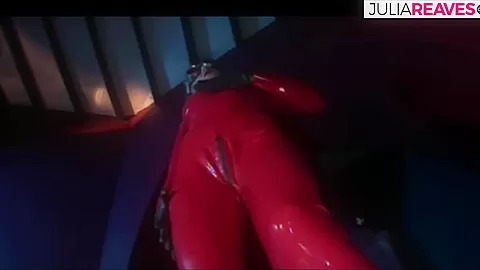 Horny Girl In Red Latex Suit Dominates