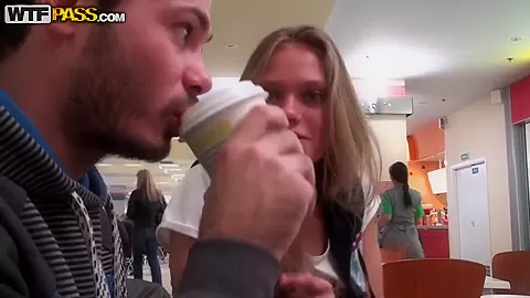 The guy is licking yogurt off his hot blonde girlfriend's body