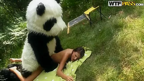 Molly is fucked by a horny panda right in the woods