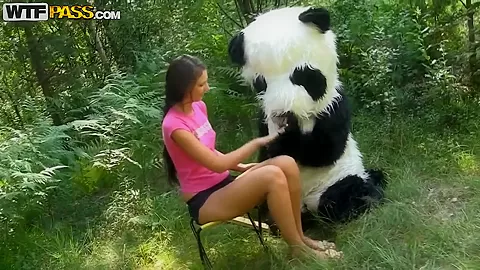 Molly is fucked by a horny panda right in the woods