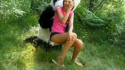 Molly is fucked by a horny panda right in the woods