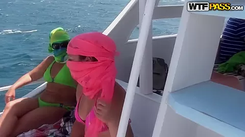 Three total hotties pose on a luxurious yact