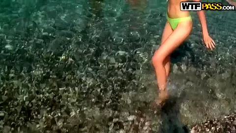 Pretty young slut spends her day at the beach and relax