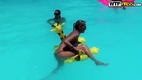 Bunch of chubby female asses swim in the pool