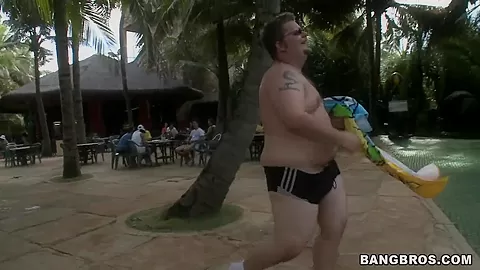 Two horny guys walking along Brazilian beach