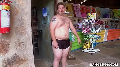 Two horny guys walking along Brazilian beach