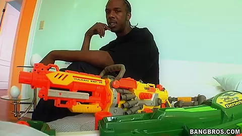 Playing with his gun is a seduction