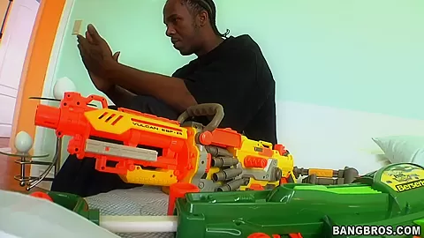 Playing with his gun is a seduction