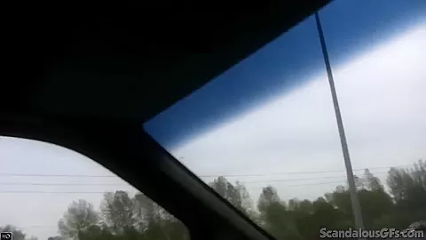 Hot Babe rubbing a cock while the guy driving caught on tape