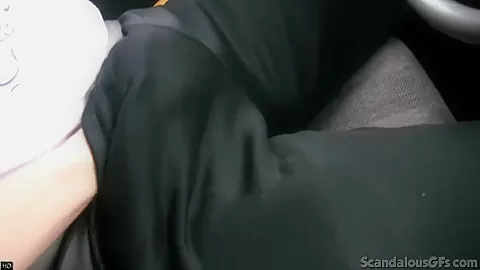 Hot Babe rubbing a cock while the guy driving caught on tape