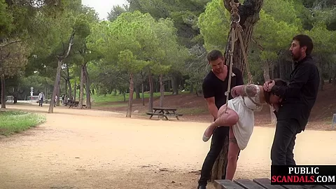 BDSM whipped teen 18+ deepthroats big cocks outdoor in public