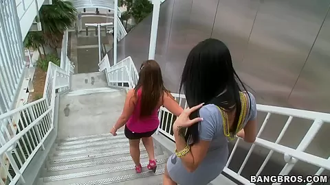 Busty chicks showing their asses and posing in a car