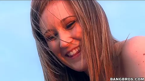 Long-haired Roxy sucks playfully the cock and makes a handjob on the roof