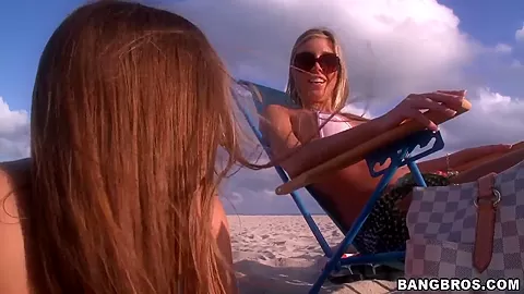 Hot gals hang out on the beach