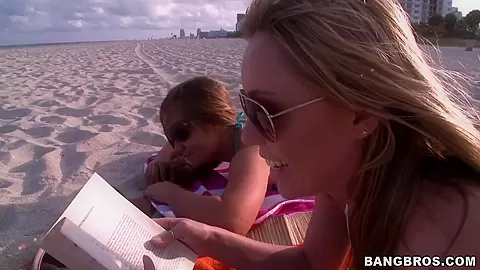 Hot gals hang out on the beach