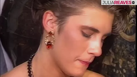 Vintage lesbians play with a long dildo