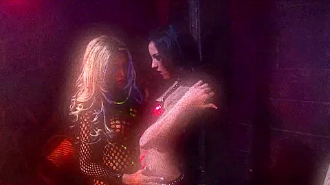 Lesbian sluts in fishnet fuck each other with a dildo