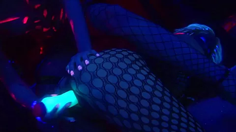 Lesbian sluts in fishnet fuck each other with a dildo