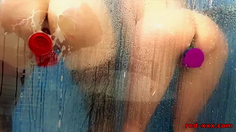 Mature redhead plays in the shower with her girlfriend