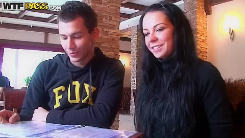 A couple spends a romantic day at a ski lodge