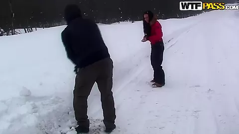 A couple spends a romantic day at a ski lodge