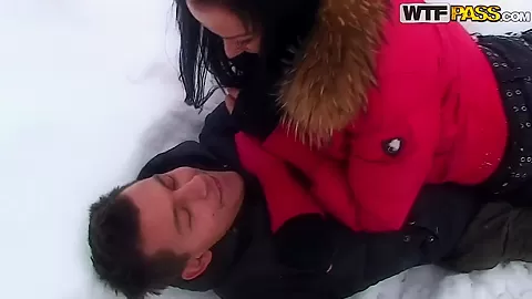 A couple spends a romantic day at a ski lodge