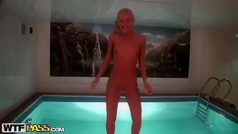 A stunning blonde goes skinny dipping ....