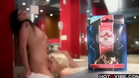 Hot lesbians finger each other in the bathtub