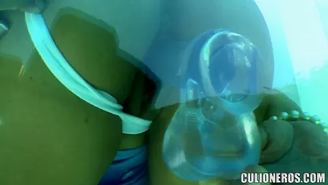 Cute Amber plays with a glass dick