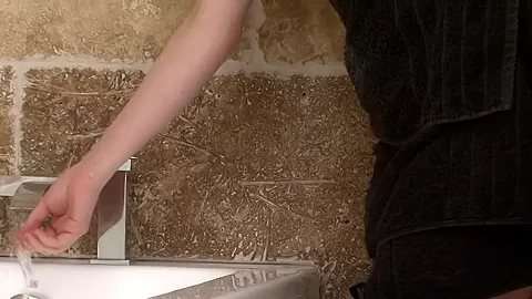 Sweet redhead teen fucked and facialized in the bathroom
