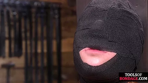 Obedient BDSM masked babe gets whipped by CMNF master