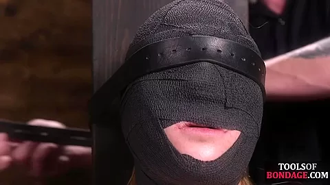 Obedient BDSM masked babe gets whipped by CMNF master