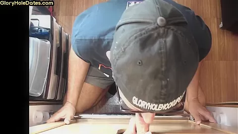 Gloryhole gay enjoys jerking big dick while sucking it