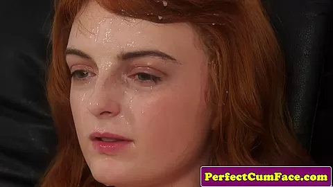 Stockinged redhead facialized in office