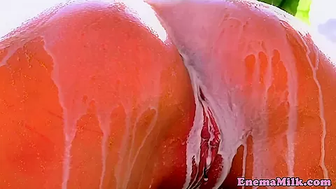 Flexible enema babe squirting milk out of ass
