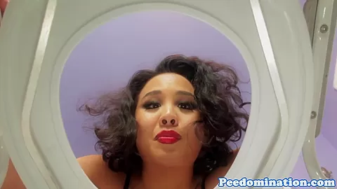 Asian domina teases and spits on toilet slave