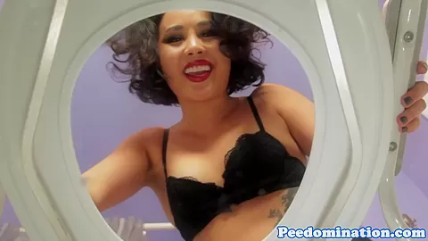 Asian domina teases and spits on toilet slave