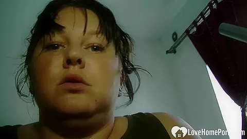 Chubby babe plays with her wet cunt