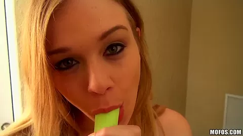 Young blonde Alaina rubs and teases herself with two dildos