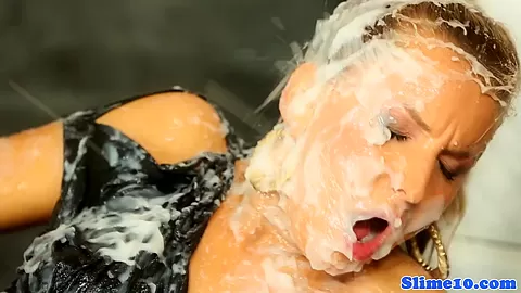 Gloryhole fucked lady licks cum of floor