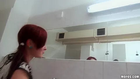 Sex appeal redhead bitch fucked in restroom