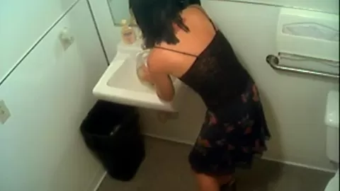 Kinky amateur pissing in restroom